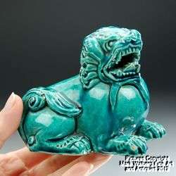 Small Pair of Chinese Turquoise Glazed Buddhistic Foo Lions, 18/19th 
