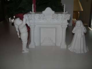 Collectible Dept 56 Winter Silhouettes Decorating the Mantle  