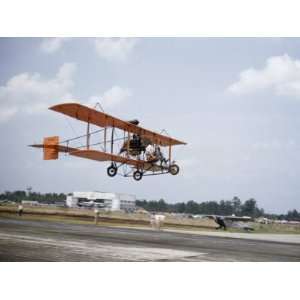  Stunt Pilot Flies a 1910 Custiss Pusher at an Airshow 