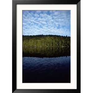 Shoreline and Clouds Reflected in the Still Waters of Rainbow Lake 