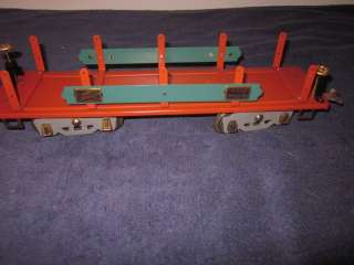 AMERICAN FLYER 4022 WIDE STANDARD GAUGE MACHINERY FLAT CAR WITH STAKES 