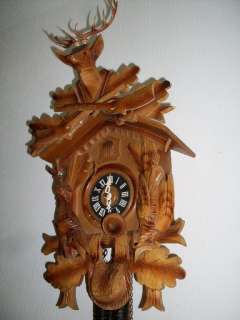 in excellent condition, all hand carved wood, deer in wood, no glue 