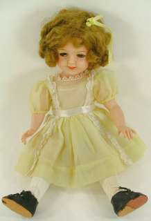   discoloration on legs, moderate discoloration on rest of doll