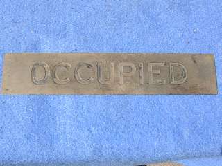   or brass OCCUPIED sign   from Pullman car or cruise ship ??  