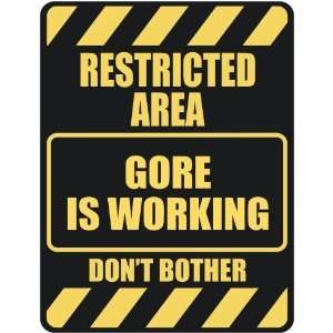   RESTRICTED AREA GORE IS WORKING  PARKING SIGN