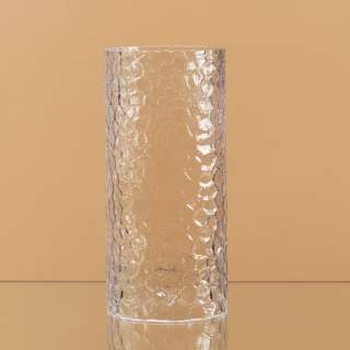 This glass cylinder shaped hammered hurricane candle holder holds 3 
