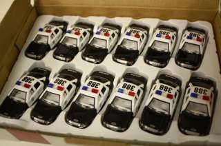 This Listing is for a box(12 cars) of Caprice Police cars.