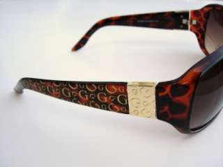   sunglasses with tortoise shell undertones and gold colored accents