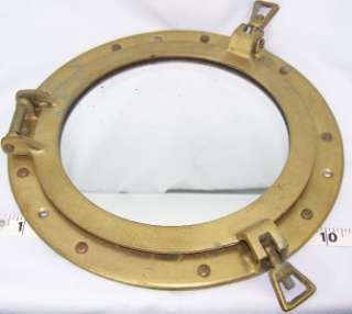 You will be purchasing a brass porthole with a mirror where the window 