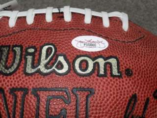 Signature is hand signed on an Official Wilson Football. This football 