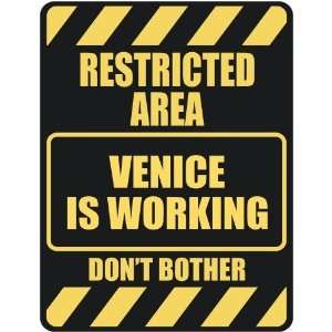   RESTRICTED AREA VENICE IS WORKING  PARKING SIGN