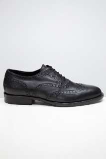 Common Projects Black Wingtip Slip on for men  