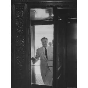  Gov. Nelson A. Rockefeller Entering the Doorway During the 