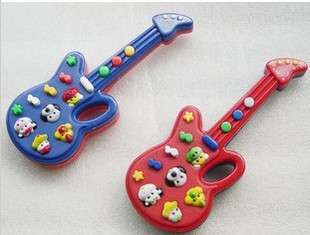   bid for ONE Guitar Musical Toy for kids that can plays 12 Music