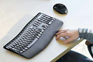 Comfort Curve keyboard with soft touch palm rest
