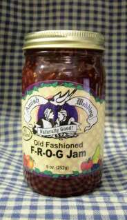   is an 8 ounce jar of Amish Wedding Brand Old Fashioed F R O G Jam